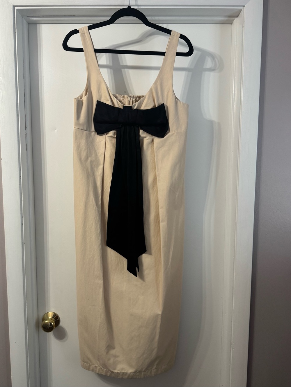 Maeve Elegant Cream Dress with Black Bow Accent